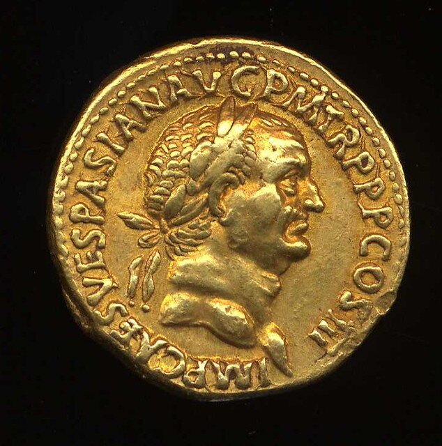 Roman gold coin with the profile of emperor Vespasianus.